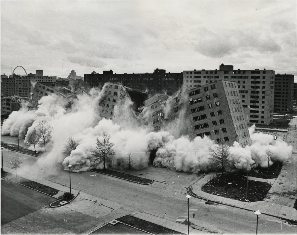Demolition of a housing block in Koyaanisqatsi, accompanied by Philip Glass's "Pruit Igoe," where the destruction of the building is transformed into a visual and auditory experience of an almost sublime nature.