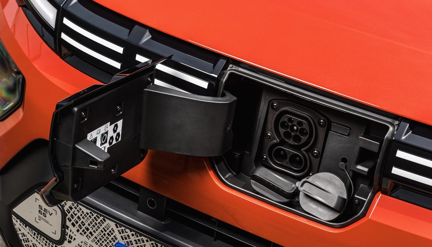 Dacia Spring - Carga Puerto Abierto